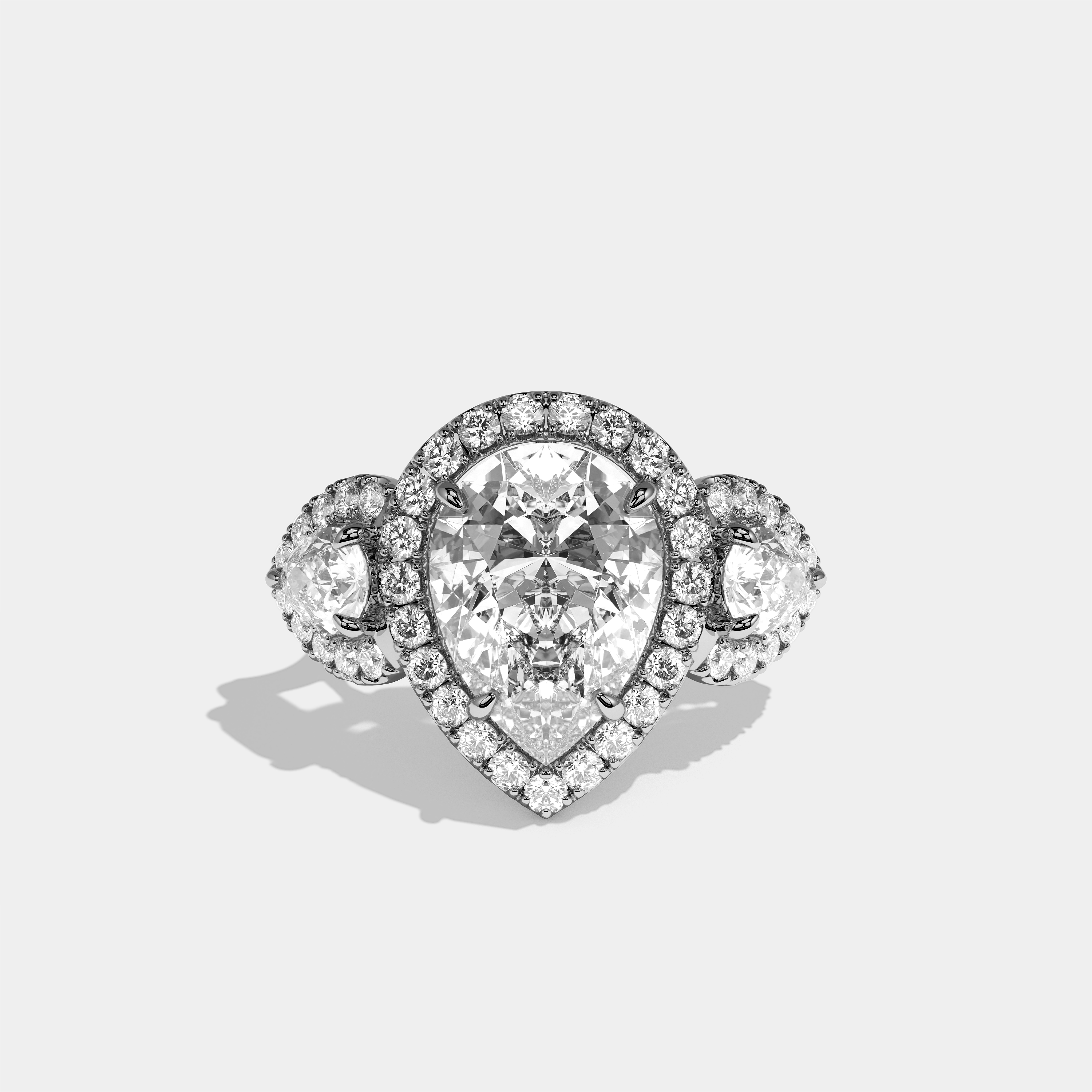 Dorothea Élégance Diamond Pear Halo Engagement Ring 18K White Gold 16.00ct