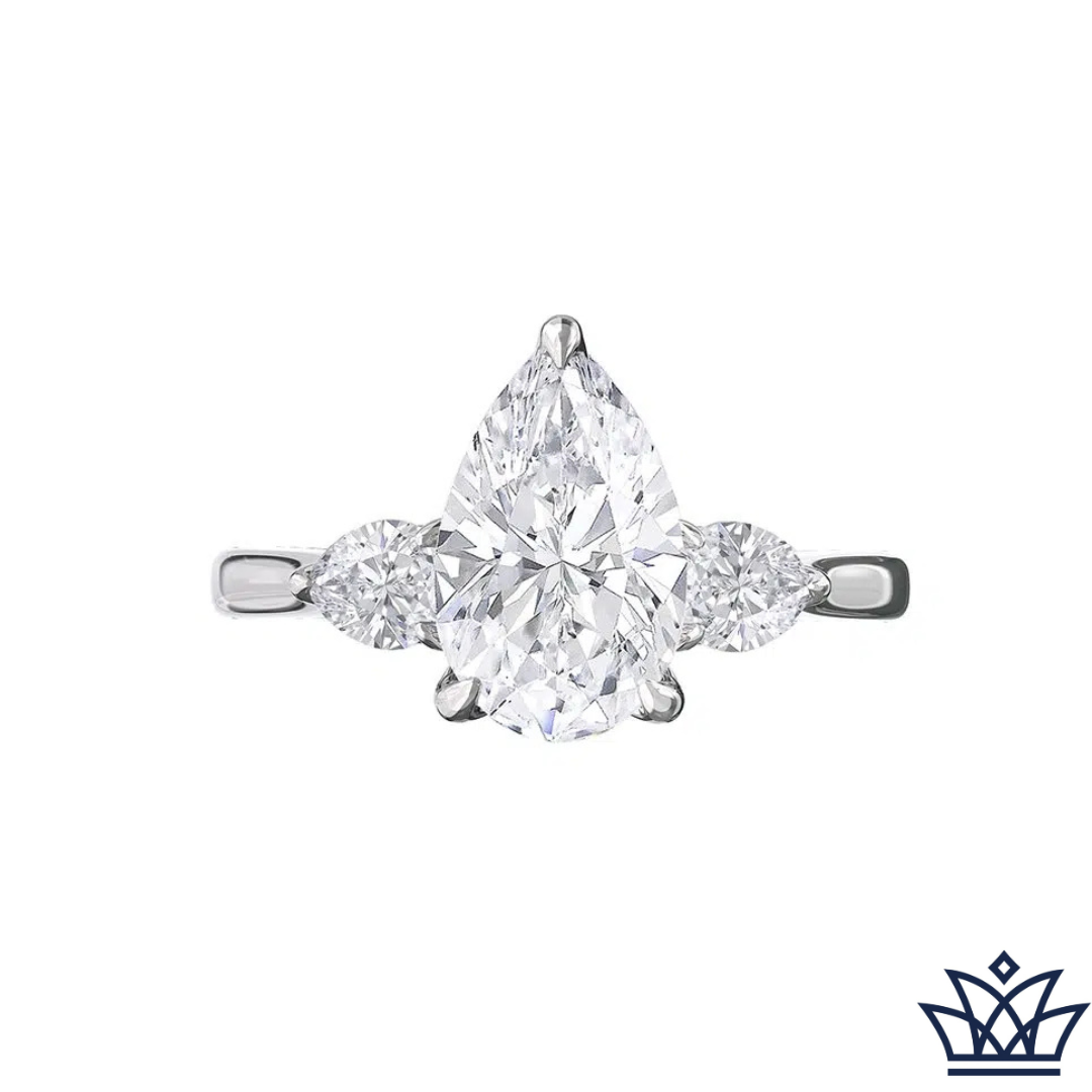 Petal Set Three Stone Pear Engagement Ring
